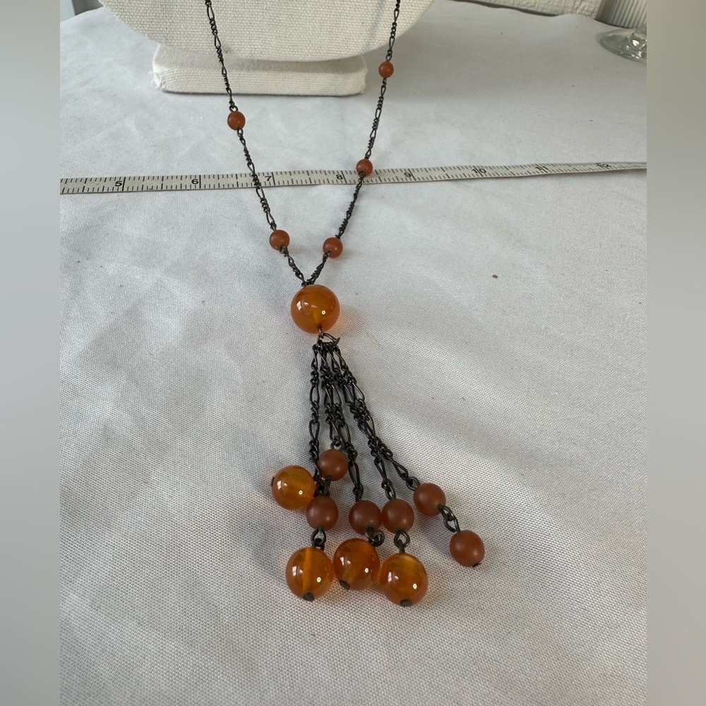 Long vintage DKNY amber colored tassel necklace